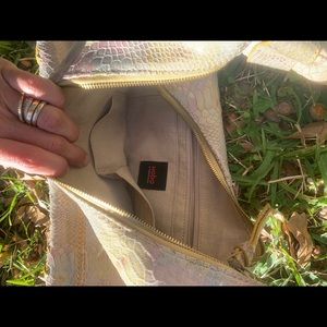 Hobo snakeskin bag in a crescent style